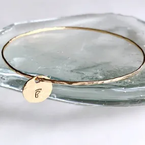 Foot logo bangle